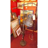 An industrial style painted metal floor standing lamp