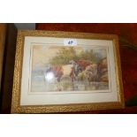 An early 20th century watercolour of cattle drinking at a riverbank, glazed and framed