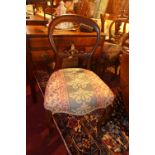 A set of four Victorian mahogany dining chairs and one other raised on cabriole supports