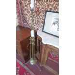 A Victorian brass telescope standard lamp