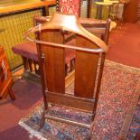 SOLD IN TIMED AUCTION A mid 20th century mahogany gentlemans valet.