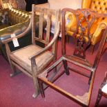 A wooden rocking chair having chip carved back, along with a George III Chippendale Revival mahogany