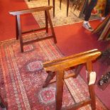 A pair of 19th century oak and cast iron coffin trestles