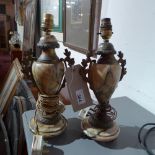 A pair of marble table lamps of urn form with ormolu mounts