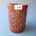 A Chinese carved bamboo brush pot having landscape scenes in relief