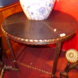 A contemporary leather topped centre table