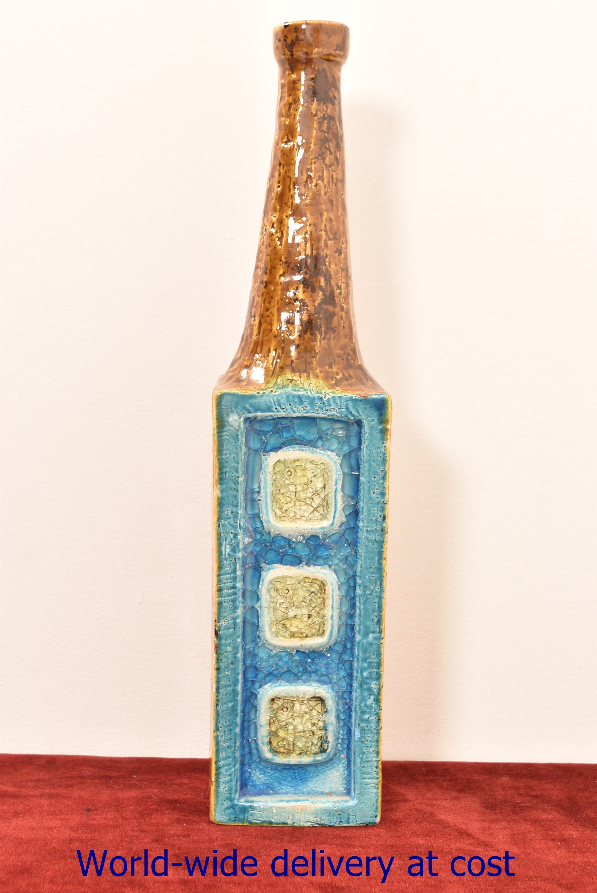 A 20th century studio pottery bottle of