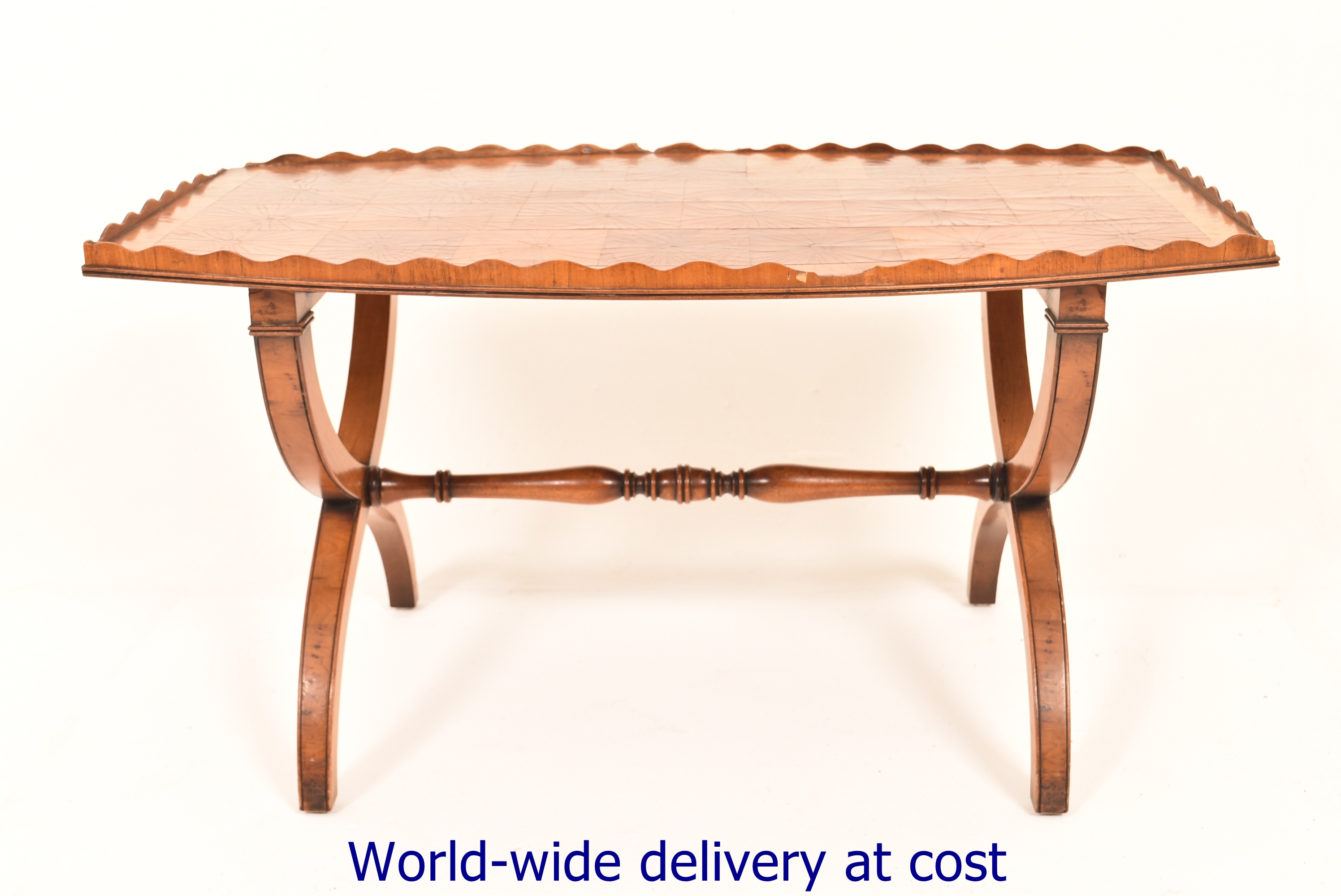 A 20th Century yew wood coffee table, tr