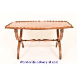 A 20th Century yew wood coffee table, tr