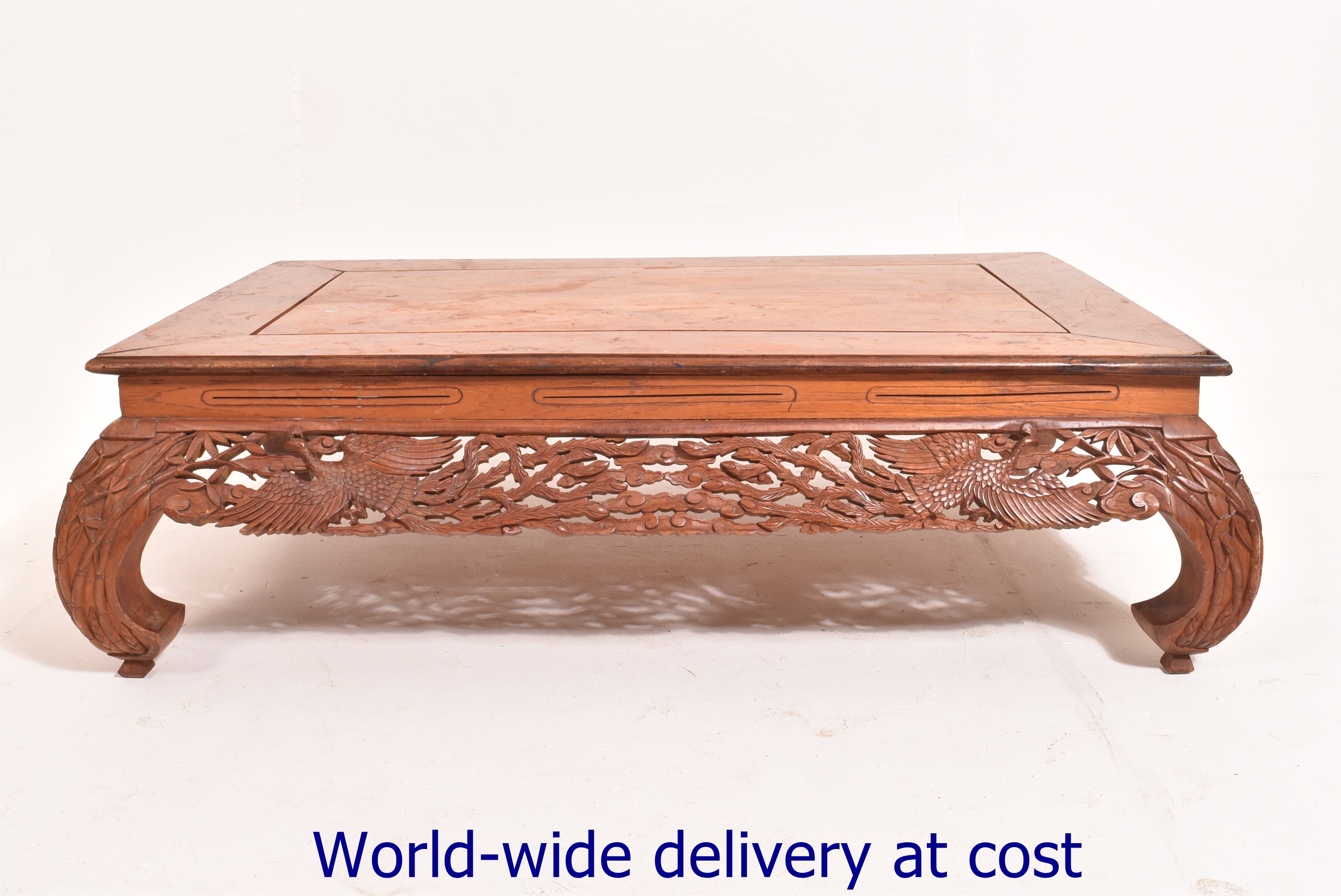 A 20th Century Chinese teak low table, t