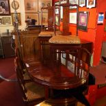 A Chinese blackwood extending dining table together with the six matching chairs