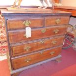 A Georgian 18th century oak and mahogany crossbanded chest fitted two short and three long drawers