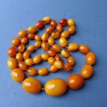 A fine butterscotch amber necklace, purchased from SAC Freres Amber Merchants,