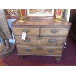 An antique mahogany chest of two short over two long drawers