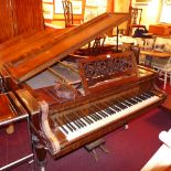 A Victorian Collard and Collard rosewood baby grand piano with ivory keys