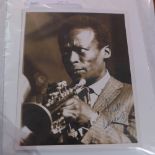 An autographed original 1950's photograph of Jazz trumpeter Miles Davis