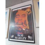 A framed Bob Marley poster,