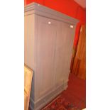 A blue painted wardrobe fitted pair of p