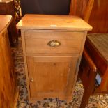 An Edwardian pine side cabinet with a si