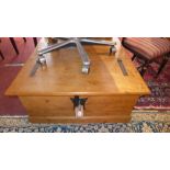 An Indonesian style pine coffee table wi