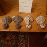 A set of four cast iron furniture feet o