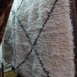 A handmade ivory wool Beni Ourain Berber