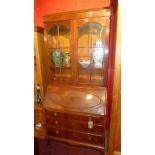 A mahogany bureau bookcase, with two gla