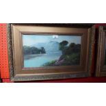 A lake and castle ruins study within gilt frame