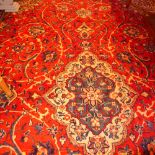 A fine central Persian Sarouk carpet 386 x 265cm central double pendant medallion with repeating