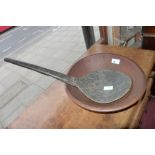 An antique wooden fruit bowl and spoon