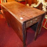 A Georgian style mahogany Pembroke table on square supports