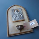 A marble backed icon, the cast metal portrait of Jesus signed L.