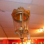 A large brass hanging lantern,