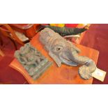 An Indian Hindu carved wood Ganesh mask together with a similar carving of Ganesh