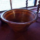 A terracotta dairy bowl