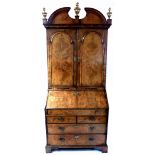 SOLD AS AFTER SALE A William and Mary figured walnut Bureau bookcase,