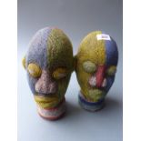 A pair of Kenyan beaded heads