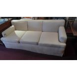 A contemporary three seater sofa upholst