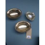 A pair of silver bonbon dishes London 19