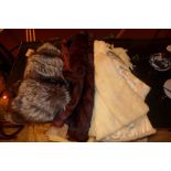 A collection of three fur stoles