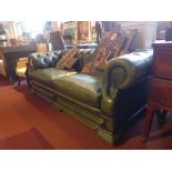 A three seater dell brook green leather