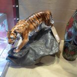 A large Royal Doulton figure of a tiger