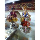 A pair of German porcelain figures of a