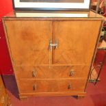 A 1970's cabinet with panel doors over t
