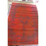 A Keshan style carpet, having a red fiel