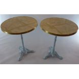 A Pair of pub tables with painted cast i