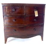 A bow fronted mahogany chest of drawers