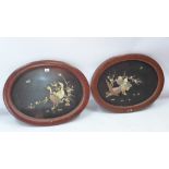 A pair of Chinese pietra dura panels depicting birds in relief,