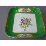 An 18th century Sevres porcelain dish, hand painted with flowers, having a green border,