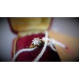 An 18ct gold solitaire diamond ring